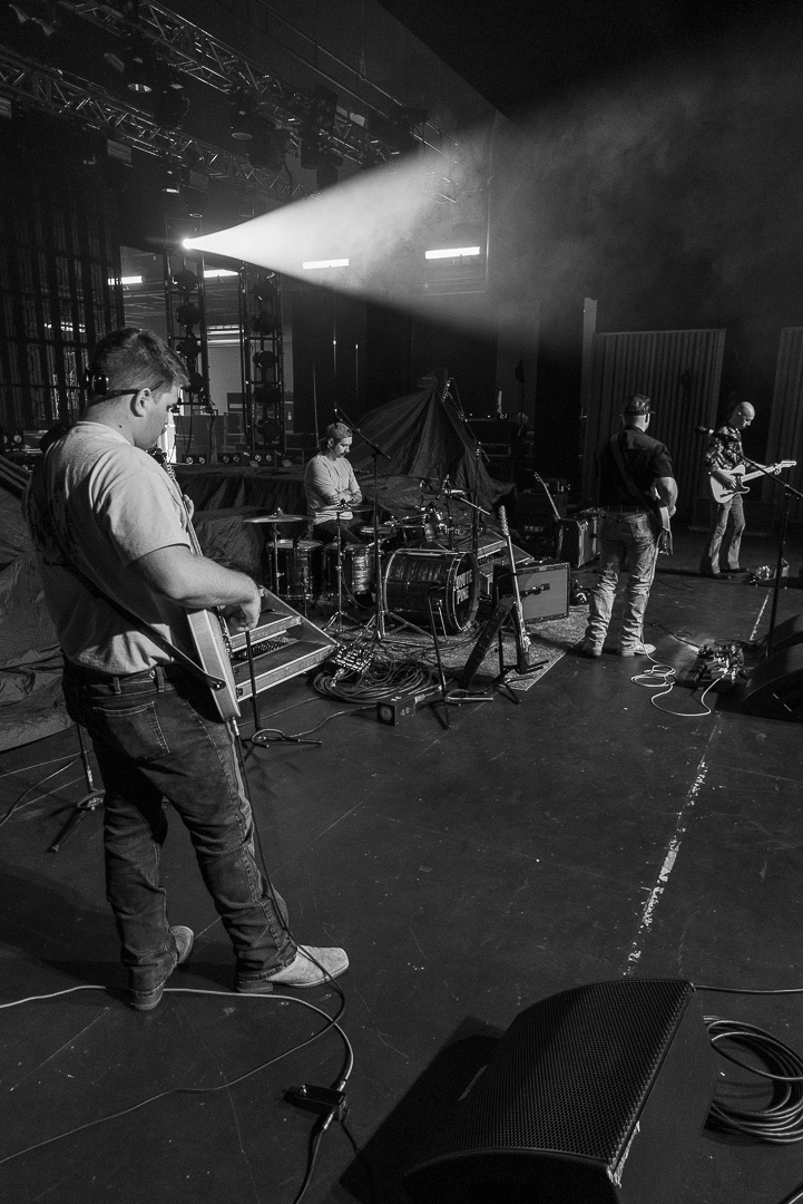 Soundcheck under a single spotlight