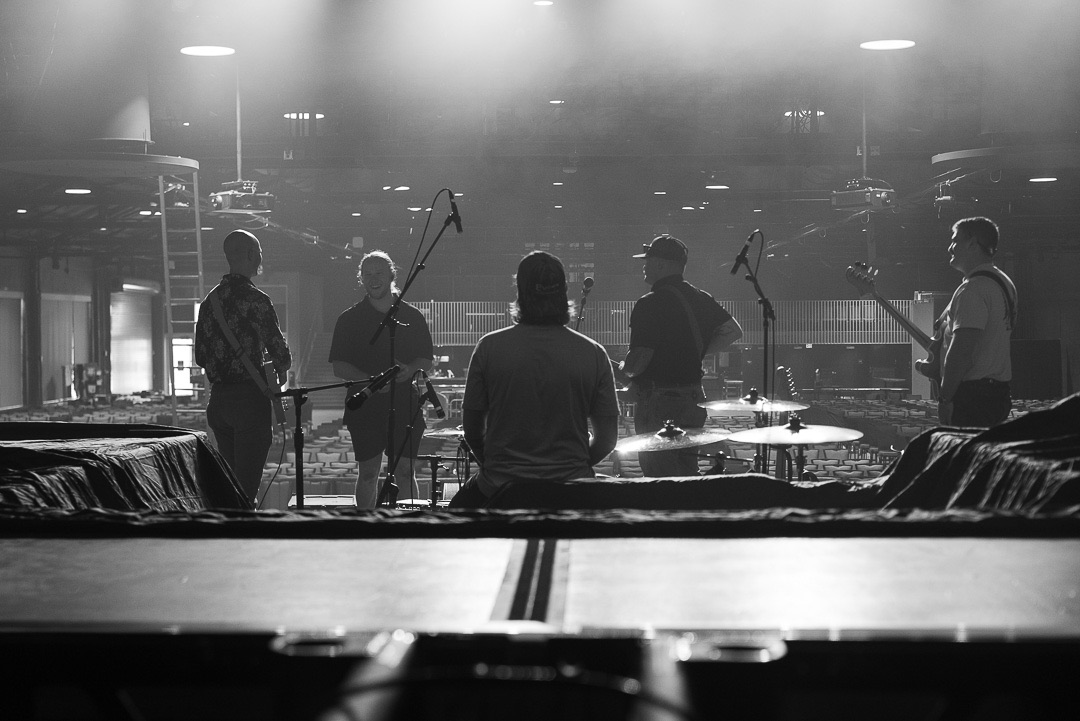 View from behind the drums toward the band